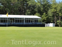 clear span tent with glass walls and scaffold floor
